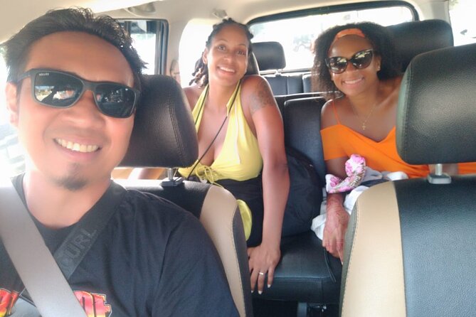 Bali Car Hire With English Speaking Friendly Driver - East-coast beach stops: Keramas, Lebih, and the port of Padangbai
