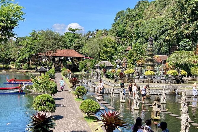 Bali Gate of Heaven Temple, Waterfall, Water Palace & Swing - Stop 1: Tukad Cepung Waterfall and the cave-ray photo moment