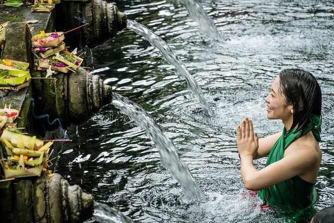 Bali Tirta Empul Tours Experience with Spiritual Cleansing - Ulu Petanu Waterfall: a calmer jungle break with a swim option