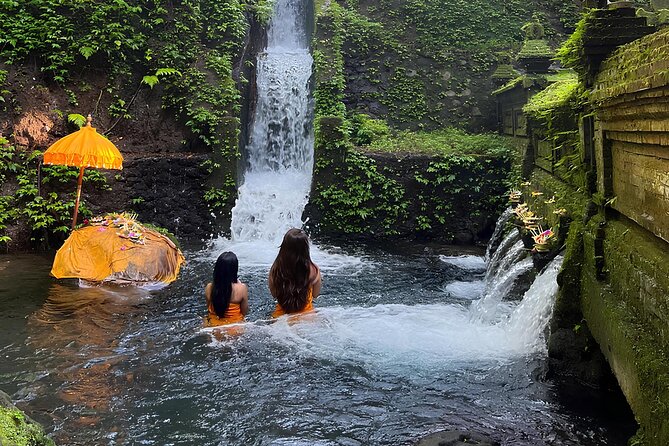Bali: Water Purification at Pura Mengening - Dressing for the ceremony: sarong, kebaya, and respectful participation