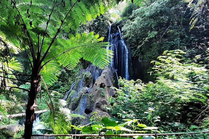 Bali Waterfall in One Day Tours, Hidden Waterfall - All Inclusive - Stop 1: Kanto Lampo Waterfall and the black-rock photo angle