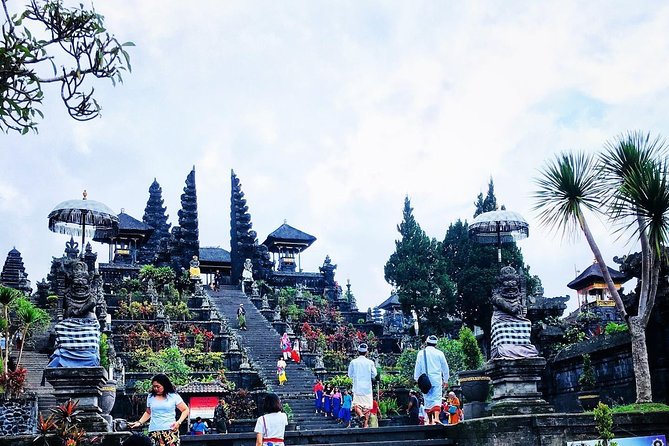 Bali Waterfalls and Temples Tour - Goa Raja Waterfall: forest steps, cool water, and that infinity-pool style feel