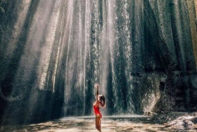 Discover the best waterfalls in Ubud and rice terraces tour - Kanto Lampo Waterfall: a standout shape and a river below