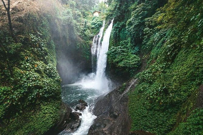 Full day Ubud and Tanah Lot tour - Stop 2: Tegenungan Waterfall for jungle views and optional steps down