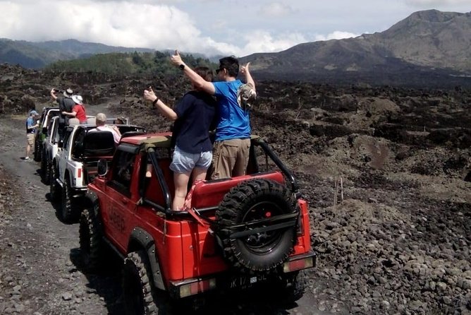 Mount Batur Jeep Sunrise & Overnight Glamping Experience - 4WD exploration after sunrise: lava and sand fields up close
