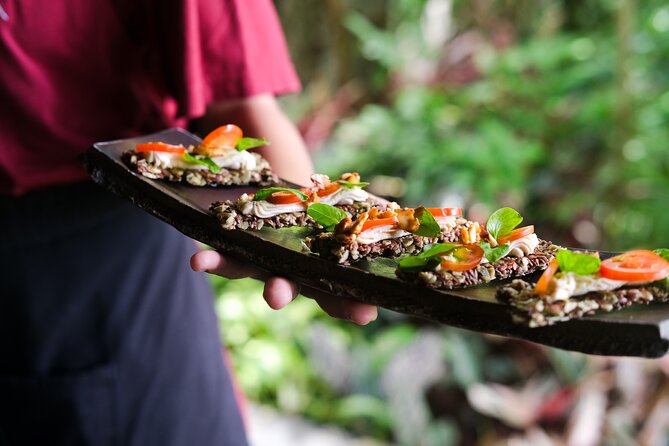 Plant Based Food Tour in Ubud - Moksa Restaurant: raw lasagna and tempeh satay in a garden setting
