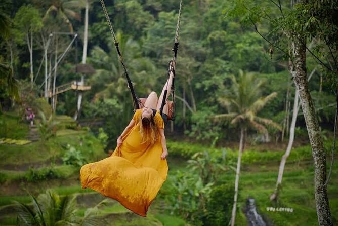 Private Day Tour To Waterfalls And Ubud Sightseeing - Kanto Lampo Waterfall: terraced rocks and calm photo moments