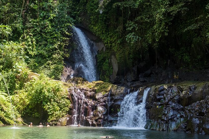 Swimming At Taman Sari Waterfall & Visit The Best Site Of Ubud - Puseh Batuan Temple: carvings in a village you can feel